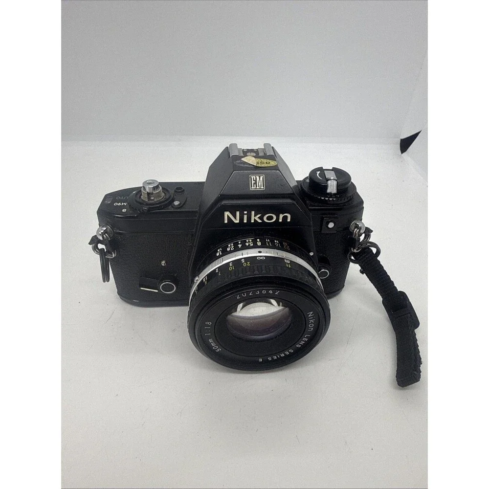 Vintage Nikon EM Black SLR Film Camera with Nikon Lens